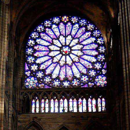 Rose Window, Northern Nave of St. Denis, on which the reconstruction of the Northern Nave began in 1231 AD. 1231 is also the year that the ban on teaching the <i>libri naturales</i> at the University of Paris effectively lapsed, and quite possibly Richard Rufus began his lectures on Aristotle's metaphysics and natural philosophy at Paris. RRP thanks Shannon Kyles for permission to reproduce her photograph of the rose window in the northern nave of St. Denis.